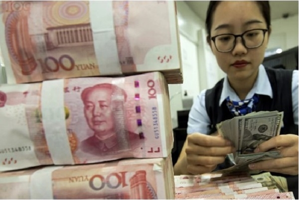 Vào tháng 5.2020, Viện Tài chính Quốc tế cho biết khoản nợ Trung Quốc vay phần còn lại của thế giới đã tăng lên hơn 6% GDP toàn cầu. Nguồn ảnh: AP.