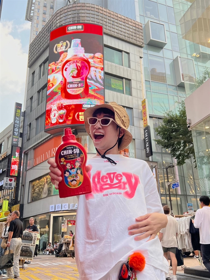 A billboard of CHIN-SU chili sauce in Dotonbori, Osaka 