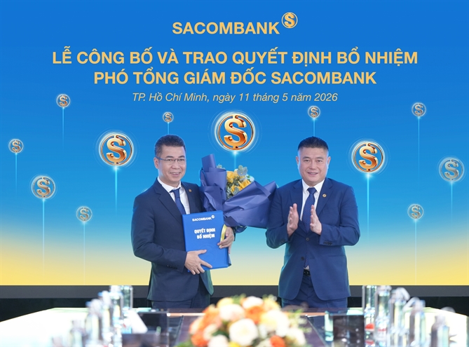 SACOMBANK kiện toàn đội ngũ lãnh đạo cấp cao Ông Nguyễn Đức Thụy, Phó Chủ tịch thường trực HĐQT trao Quyết định bổ nhiệm cho ông Nguyễn Hoàng Hải, Phó Tổng Giám đốc.