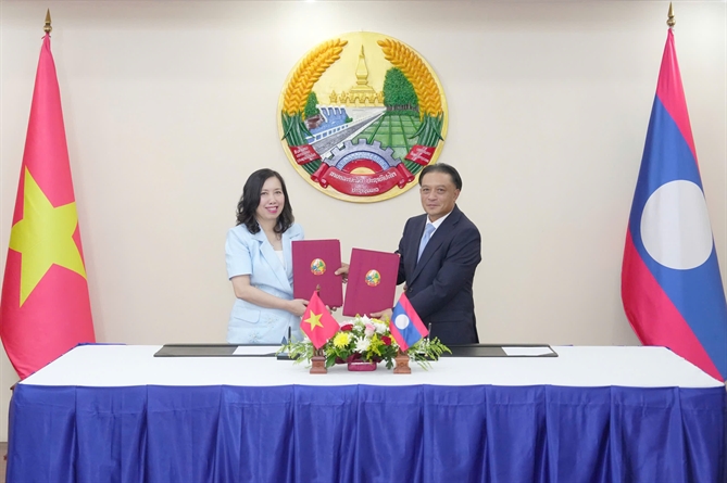 Hai Bộ Ngoại giao ký kết hợp tác về công tác người Việt/người Lào ở nước ngoài